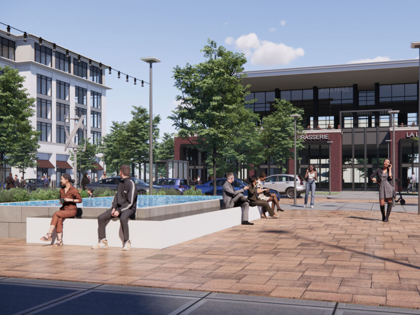 Outdoor fountain with people sitting around it